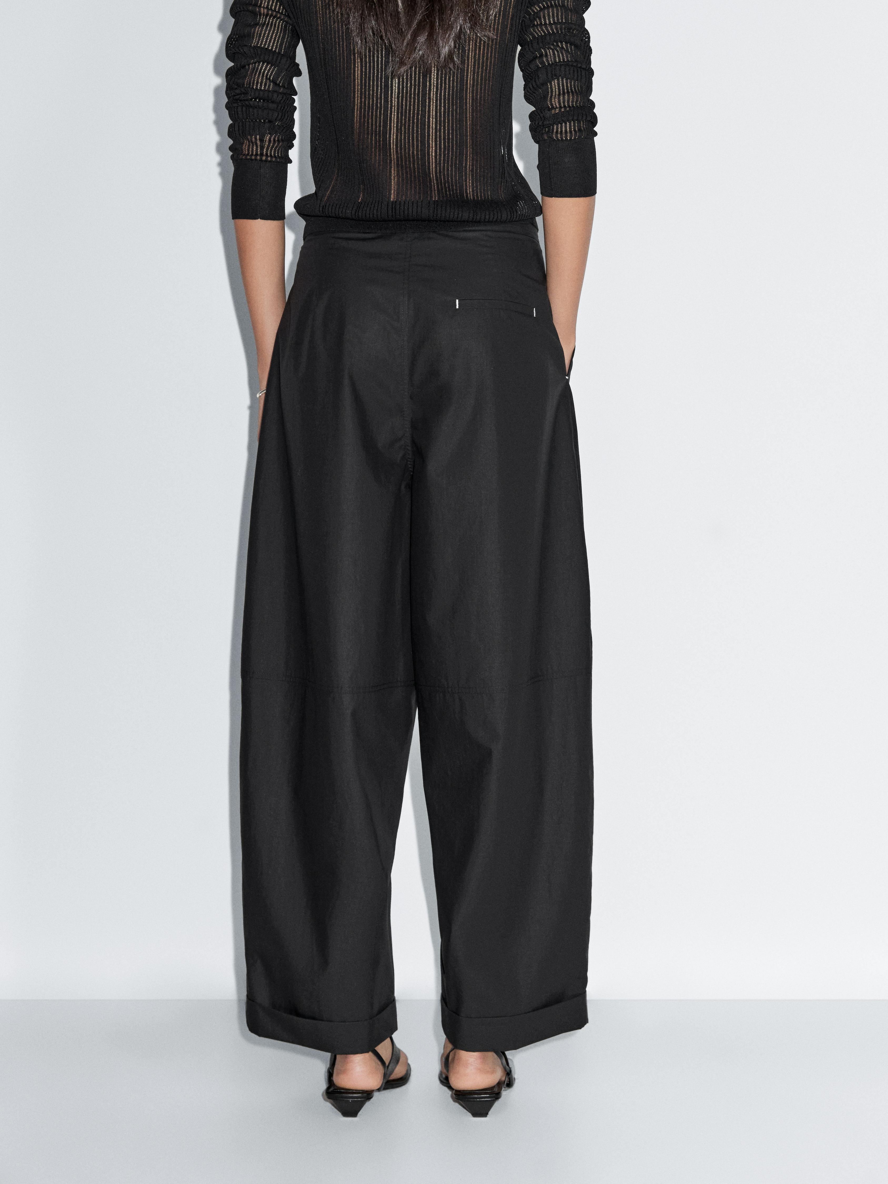 Barrel fit trousers with turn-up detail